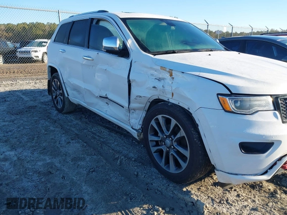 2017 Jeep Grand Cherokee Overland with VIN 1C4RJFCG8HC641729, listed as a IAAI auction lot 41233125 with 116,874 mi miles. Bid and sale history available at carsss.com. Image 6.