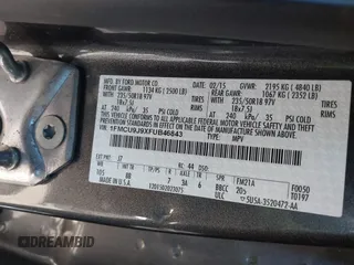 2015 Ford Escape Titanium with VIN 1FMCU9J9XFUB46843, listed as a IAAI auction lot 41800938 with 91,034 mi miles. Bid and sale history available at carsss.com. Image 9.
