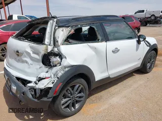 2013 MINI Paceman S ALL4 with VIN WMWSS7C51DWN51802, listed as a IAAI auction lot 41885786 with 96,386 mi miles and . Bid and sale history available at DreamBid. Image 4.