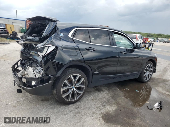 2020 BMW X2 sDrive28i with VIN WBXYH9C05L5R39182, listed as a Copart auction lot 56929605 with 87,253 mi miles and Non repairable. Bid and sale history available at DreamBid. Image 3.