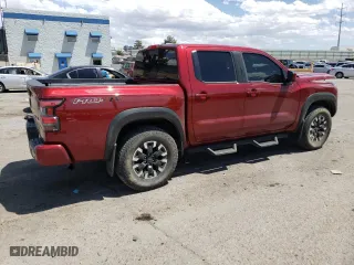 2023 Nissan Frontier PRO-4X with VIN 1N6ED1EK2PN618618, listed as a Copart auction lot 57197604 with 25,362 mi miles and Salvage Title. Bid and sale history available at carsss.com. Image 3.