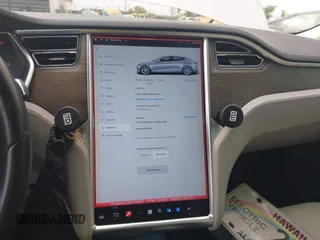 2013 Tesla Model S with VIN 5YJSA1AC3DFP10537, listed as a IAAI auction lot 40707549 with 103,111 mi miles and . Bid and sale history available at DreamBid. Image 19.
