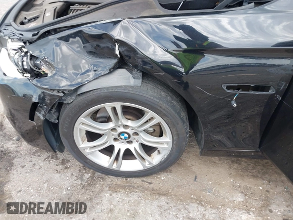 2013 BMW 5 Series 528i with VIN WBAXG5C51DDY33333, listed as a IAAI auction lot 41685179 with 94,936 mi miles and . Bid and sale history available at carsss.com. Image 6.