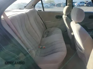 1996 Saturn SL with VIN 1G8ZK5272TZ137198, listed as a Copart auction lot 72446614 with 99,586 mi miles and Salvage title. Bid and sale history available at DreamBid. Image 10.