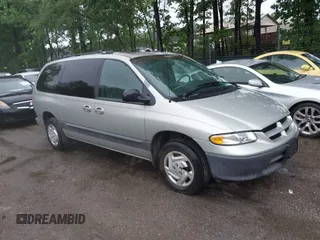 1999 Dodge Caravan SE z VIN 2B4GP44G1XR334592, wystawiony jako IAAI lot #42312289 z przebiegiem 283 281 mil mil oraz . Historia ofert i sprzedaży dostępna na DreamBid. Obrazek 1.