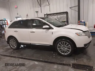 2011 Lincoln MKX with VIN 2LMDJ8JK8BBJ34012, listed as a IAAI auction lot 41524792 with 142,670 mi miles. Bid and sale history available at carsss.com. Image 14.
