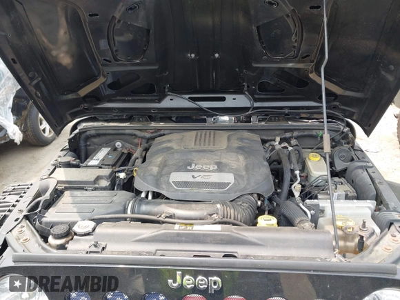 2015 Jeep Wrangler Unlimited Sahara with VIN 1C4HJWEG3FL661568, listed as a IAAI auction lot 42387810 with 140,927 mi miles and . Bid and sale history available at DreamBid. Image 10.