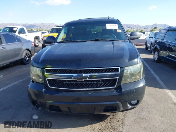 2012 Chevrolet Suburban LT with VIN 1GNSCJE00CR226285, listed as a IAAI auction lot 42059936 with 318,948 mi miles and . Bid and sale history available at DreamBid. Image 12.
