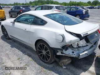 2020 Ford Mustang EcoBoost with VIN 1FA6P8TH2L5149304, listed as a IAAI auction lot 41833277 with 96,450 mi miles and . Bid and sale history available at DreamBid. Image 3.