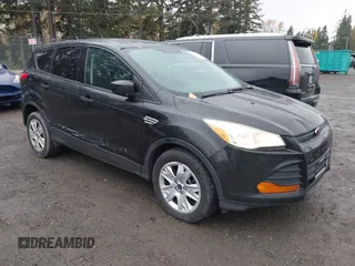 2014 Ford Escape S with VIN 1FMCU0F77EUB50320, listed as a IAAI auction lot 40744542 with 143,443 mi miles. Bid and sale history available at carsss.com. Image 1.