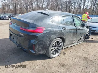2022 BMW X4 M40i with VIN 5UX43DT0XN9L33898, listed as a IAAI auction lot 41642374 with 8 mi miles and . Bid and sale history available at DreamBid. Image 4.