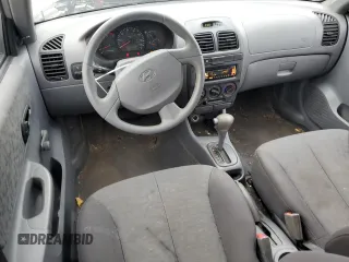 2005 Hyundai Accent GLS with VIN KMHCG45C45U631414, listed as a Copart auction lot 73963814 with 106,617 mi miles and Salvage Title. Bid and sale history available at carsss.com. Image 8.