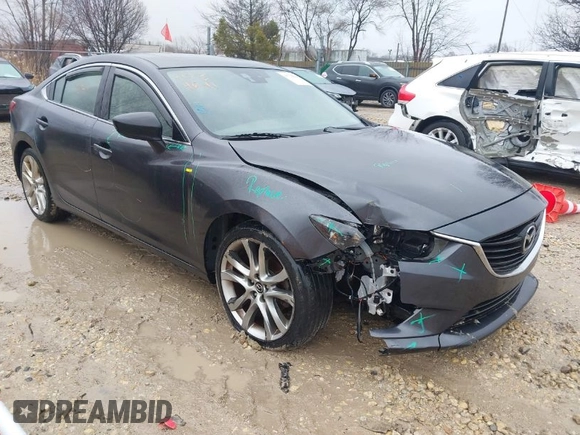 2015 Mazda 6 i Grand Touring with VIN JM1GJ1W56F1207077, listed as a IAAI auction lot 41734641 with 109,447 mi miles and . Bid and sale history available at DreamBid. Image 1.
