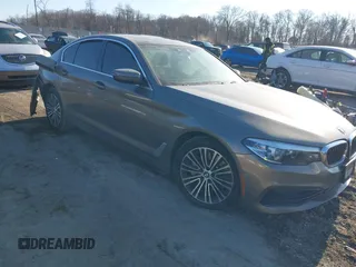 2019 BMW 5 Series 530i xDrive with VIN WBAJA7C54KWW40517, listed as a IAAI auction lot 41427443 with 51,028 mi miles. Bid and sale history available at carsss.com. Image 1.