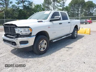 2020 Ram 2500 Tradesman with VIN 3C6UR5CL9LG258440, listed as a IAAI auction lot 42073257 with 33,489 mi miles and . Bid and sale history available at DreamBid. Image 2.