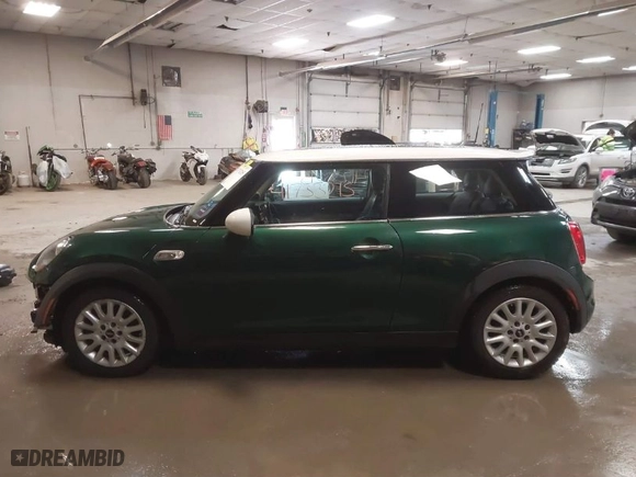 2015 MINI Cooper Hardtop S with VIN WMWXP7C57F2A39384, listed as a IAAI auction lot 41733215 with 60,750 mi miles. Bid and sale history available at carsss.com. Image 15.