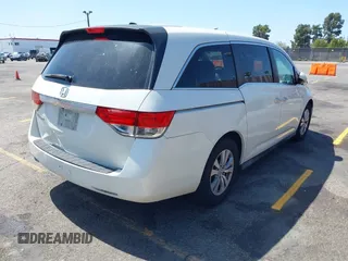 2015 Honda Odyssey EX-L with VIN 5FNRL5H67FB017554, listed as a IAAI auction lot 41974821 with 76,130 mi miles and . Bid and sale history available at carsss.com. Image 4.