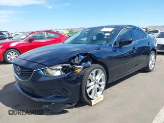 2015 Mazda 6 i Touring with VIN JM1GJ1V61F1170532, listed as a IAAI auction lot 42078436 with 154,630 mi miles and . Bid and sale history available at DreamBid. Image 2.