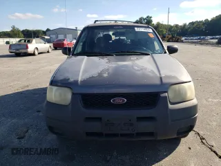 2004 Ford Escape XLS with VIN 1FMYU92134KA21707, listed as a Copart auction lot 72114804 with 219,518 mi miles and Salvage Title. Bid and sale history available at DreamBid. Image 5.