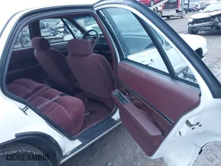 1997 Buick LeSabre Custom with VIN 1G4HP52K9VH552434, listed as a IAAI auction lot 41194261 with 102,633 mi miles. Bid and sale history available at carsss.com. Image 8.