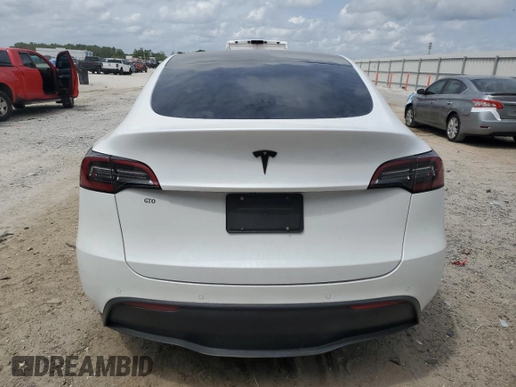 2021 Tesla Model Y Long Range with VIN 5YJYGDEE5MF203130, listed as a Copart auction lot 54642795 with 73,663 mi miles and Non Repairable. Bid and sale history available at DreamBid. Image 6.