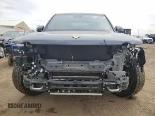 2023 Rivian R1T Adventure with VIN 7FCTGAAA3PN000801, listed as a Copart auction lot 51600895 with 19,486 mi miles and Salvage Title. Bid and sale history available at carsss.com. Image 5.