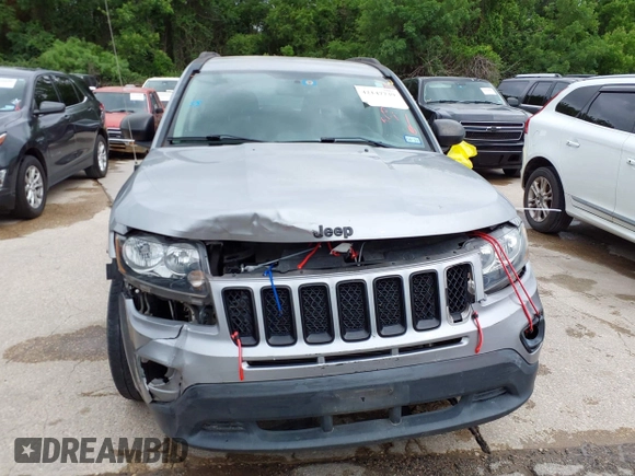 2014 Jeep Compass Sport with VIN 1C4NJCBA3ED769764, listed as a IAAI auction lot 42147739 with 141,979 mi miles. Bid and sale history available at carsss.com. Image 6.