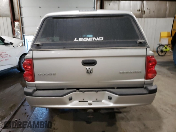 2010 Dodge Dakota with VIN 1D7CW2BK3AS184268, listed as a Copart auction lot 48260235 with 60,542 mi miles and Salvage title. Bid and sale history available at DreamBid. Image 6.