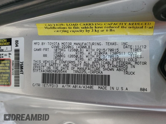2013 Toyota Tacoma z VIN 5TFTX4CN8DX026544, wystawiony jako Copart lot #55594395 z przebiegiem 232 853 mil mil oraz Szkoda całkowita • Salvage title. Historia ofert i sprzedaży dostępna na DreamBid. Obrazek 12.