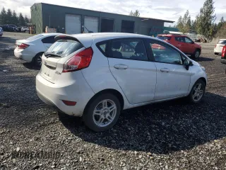 2018 Ford Fiesta SE with VIN 3FADP4EJ1JM128130, listed as a Copart auction lot 50574285 with 141,002 mi miles and Salvage Title. Bid and sale history available at DreamBid. Image 3.