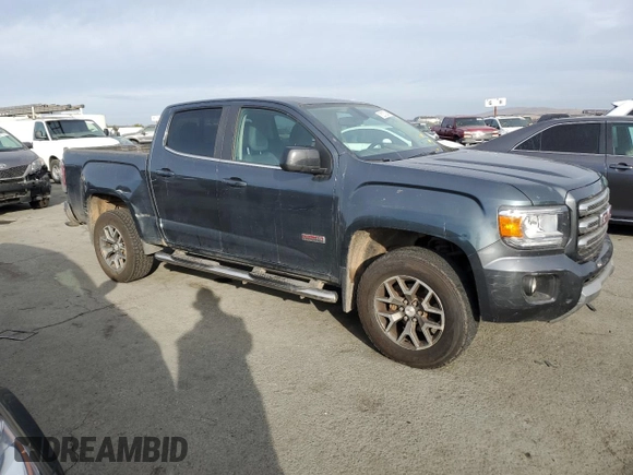 2015 GMC Canyon 4WD SLE with VIN 1GTG6BE31F1221315, listed as a Copart auction lot 78237394 with 93,411 mi miles and Salvage Title. Bid and sale history available at carsss.com. Image 4.