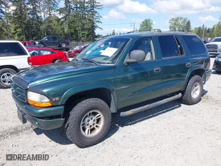 1999 Dodge Durango with VIN 1B4HS28Z3XF521133, listed as a IAAI auction lot 42068475 with 229,651 mi miles. Bid and sale history available at carsss.com. Image 2.