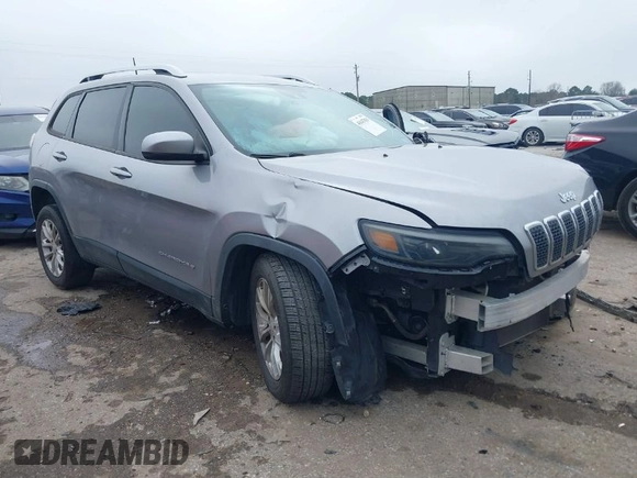 2021 Jeep Cherokee Latitude with VIN 1C4PJLCB0MD115979, listed as a IAAI auction lot 41647031 with 104,415 mi miles. Bid and sale history available at carsss.com. Image 1.