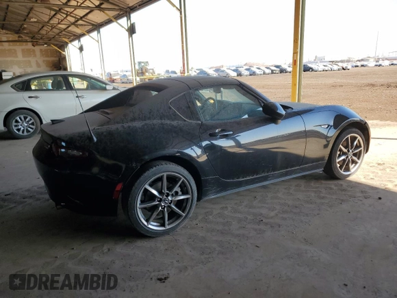 2023 Mazda MX-5 Miata Grand Touring z VIN JM1NDAM71P0551782, wystawiony jako Copart lot #88795725 z przebiegiem 22 626 mil mil oraz Nie do naprawy • Non repairable. Historia ofert i sprzedaży dostępna na DreamBid. Obrazek 3.
