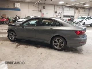2021 Volkswagen Jetta S z VIN 3VWC57BU8MM102850, wystawiony jako IAAI lot #41856714 z przebiegiem 40 754 mil mil oraz . Historia ofert i sprzedaży dostępna na DreamBid. Obrazek 13.
