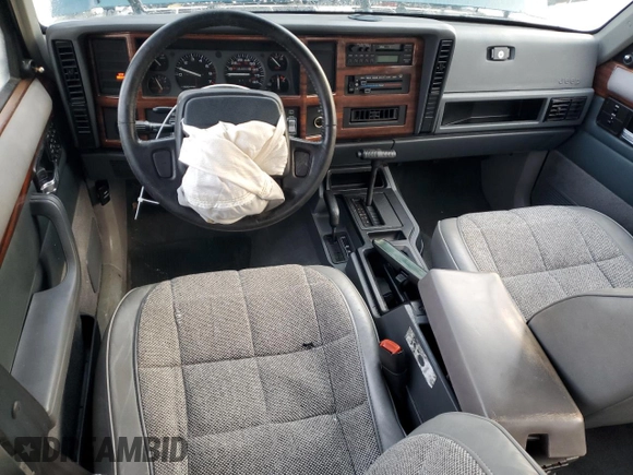 1996 Jeep Cherokee Country with VIN 1J4FJ78S7TL242853, listed as a Copart auction lot 73022554 with 84,868 mi miles and Salvage Title. Bid and sale history available at carsss.com. Image 8.