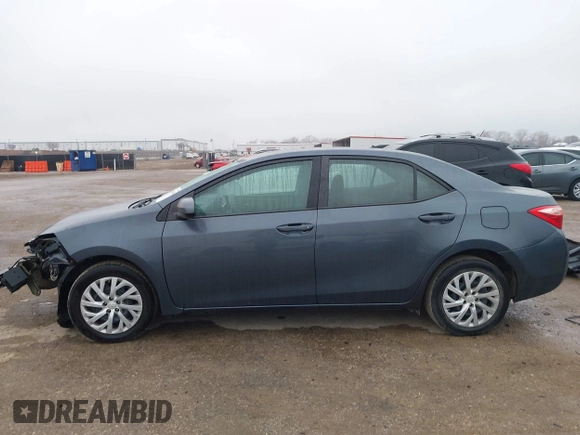 2018 Toyota Corolla L z VIN 5YFBURHE7JP831763, wystawiony jako IAAI lot #41539485 z przebiegiem 95 495 mil mil oraz . Historia ofert i sprzedaży dostępna na DreamBid. Obrazek 15.