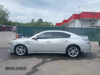 2014 Nissan Maxima S with VIN 1N4AA5AP3EC498006, listed as a IAAI auction lot 42114320 with 162,451 mi miles and . Bid and sale history available at DreamBid. Image 14.