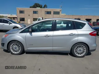 2013 Ford C-Max SEL z VIN 1FADP5BU6DL518893, wystawiony jako IAAI lot #41962282 z przebiegiem 198 219 mil mil oraz . Historia ofert i sprzedaży dostępna na DreamBid. Obrazek 14.