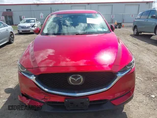 2021 Mazda CX-5 Touring z VIN JM3KFBCM1M0401717, wystawiony jako IAAI lot #42036407 z przebiegiem 35 587 mil mil oraz . Historia ofert i sprzedaży dostępna na DreamBid. Obrazek 12.