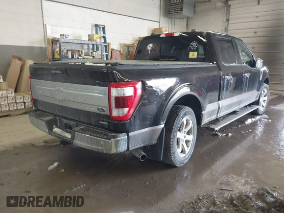 2021 Ford F-150 XL with VIN 1FTFW1E8XMFA47553, listed as a IAAI auction lot 41496255 with 83,711 mi miles. Bid and sale history available at carsss.com. Image 4.