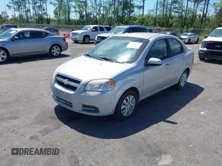 2007 Chevrolet Aveo LS with VIN KL1TD56617B098732, listed as a IAAI auction lot 41889243 with 115,426 mi miles and . Bid and sale history available at DreamBid. Image 2.