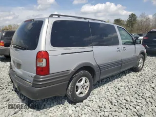 2001 Pontiac Montana with VIN 1GMDX03E61D318330, listed as a Copart auction lot 52063885 with 98,926 mi miles and Salvage Title. Bid and sale history available at DreamBid. Image 3.