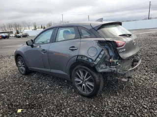 2017 Mazda CX-3 Touring with VIN JM1DKFC74H0176455, listed as a Copart auction lot 48825935 with 90,486 mi miles and Salvage Title. Bid and sale history available at carsss.com. Image 2.