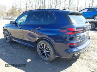 2024 BMW X5 xDrive50e with VIN 5UX43EU08R9T76677, listed as a IAAI auction lot 41777924 with 19,013 mi miles. Bid and sale history available at carsss.com. Image 3.