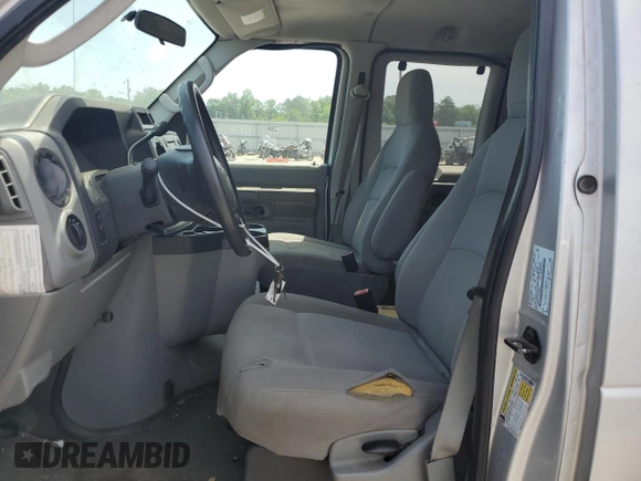 2009 Ford Econoline Passenger XL with VIN 1FBNE31L59DA62487, listed as a Copart auction lot 58073325 with 122,664 mi miles and Salvage title. Bid and sale history available at DreamBid. Image 7.
