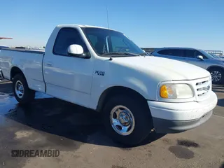 2003 Ford F-150 XL with VIN 1FTRF17293NA46808, listed as a IAAI auction lot 41156923 with 384,475 mi miles and . Bid and sale history available at DreamBid. Image 1.