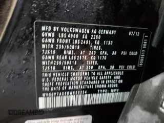 2013 Volkswagen Tiguan SE z VIN WVGBV7AX9DW529234, wystawiony jako Copart lot #41610635 z przebiegiem 130 566 mil mil oraz Szkoda całkowita • Salvage title. Historia ofert i sprzedaży dostępna na DreamBid. Obrazek 13.