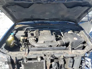 2005 Nissan Frontier LE z VIN 1N6AD07U95C401972, wystawiony jako Copart lot #48394485 z przebiegiem 302 912 mil mil oraz Szkoda całkowita • Salvage title. Historia ofert i sprzedaży dostępna na DreamBid. Obrazek 11.