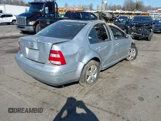 2004 Volkswagen Jetta Sedan GLS with VIN 3VWSA69M04M063629, listed as a IAAI auction lot 41771859 with 1 mi miles. Bid and sale history available at carsss.com. Image 4.